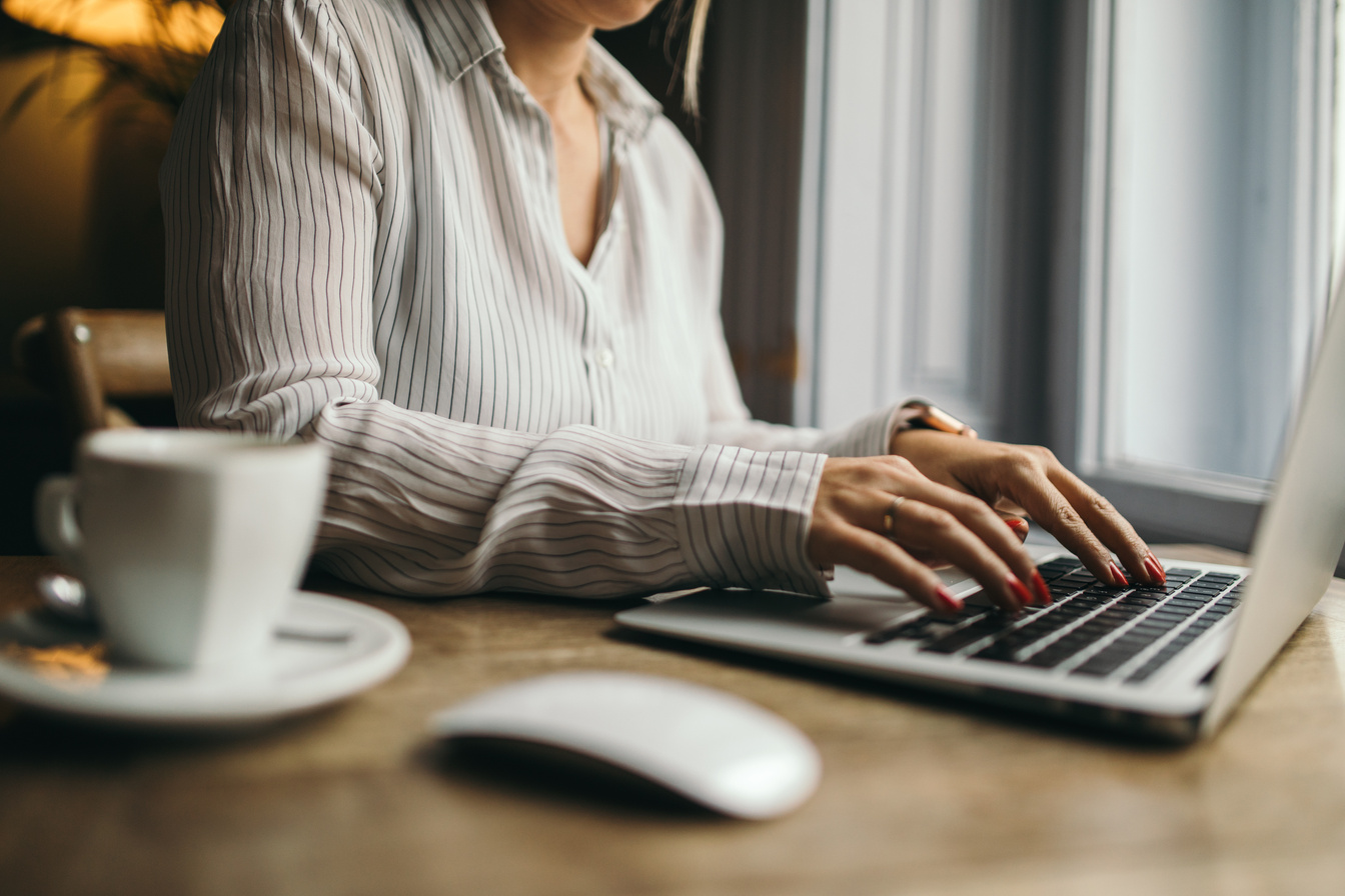 A professional typing on a laptop, showcasing Prime Virtual Solutions’ administrative assistant services that help streamline operations for realtors and loan officers in Las Vegas, NV.